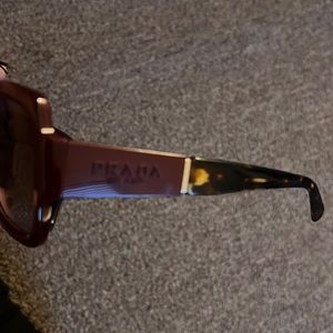 Prada sunglasses in maroon